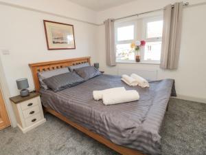 Postel nebo postele na pokoji v ubytování Bisley House