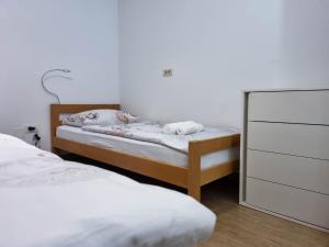 Postel nebo postele na pokoji v ubytování Apartmaji Jakob 1