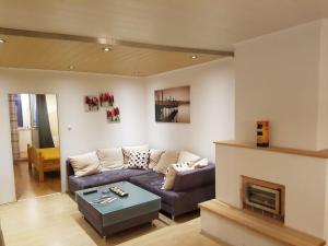 Posezení v ubytování Esslinger Hauptstr Spacious apartment with loggia