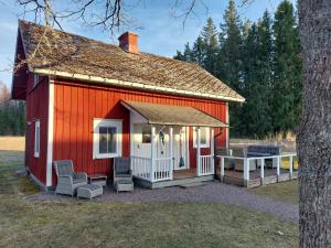 Byggingin sem sumarhúsið er í