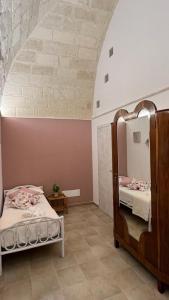 Voodi või voodid majutusasutuse B&B LE CUSPIDI toas