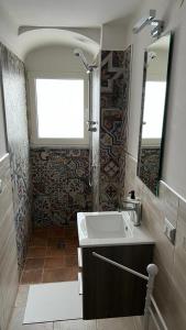 Vannituba majutusasutuses B&B LE CUSPIDI