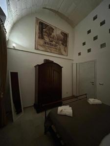 Voodi või voodid majutusasutuse B&B LE CUSPIDI toas