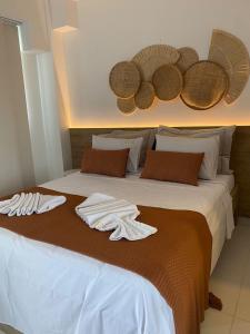 Un pat sau paturi într-o cameră la Mana Beach Flat Prime