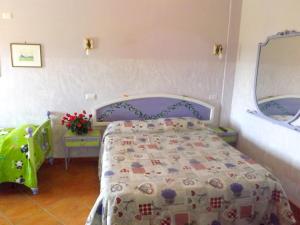 Postel nebo postele na pokoji v ubytování Agriturismo L.B.STUD