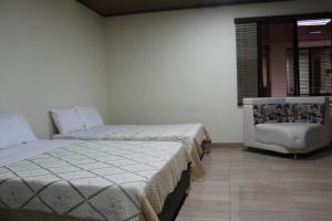 Katil atau katil-katil dalam bilik di Find Land & a Rest