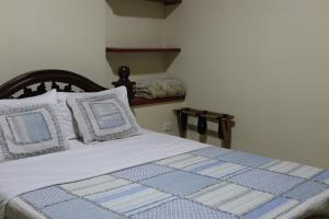 Katil atau katil-katil dalam bilik di Find Land & a Rest