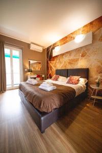 a bedroom with a large bed in a room at Hotel Sereno in Sestri Levante