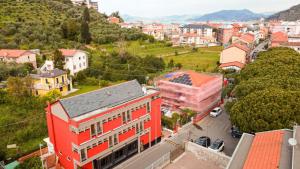 an aerial view of a city with a red building at Hotel Sereno in Sestri Levante