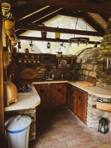 a kitchen with a sink and a counter top at Vándor tanya in Ágasegyháza