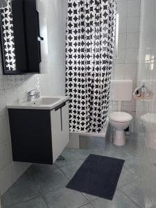 Koupelna v ubytování Apartment Anic + 37 fotografií
