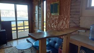 Χώρος καθιστικού στο Cabañas & SPA Carilafquen