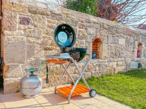 Gallery image of MINIQ HOMES 102 - Historical Stone House with Garden Cinema in Foca