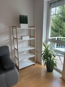 Posteľ alebo postele v izbe v ubytovaní Belvárosi apartman