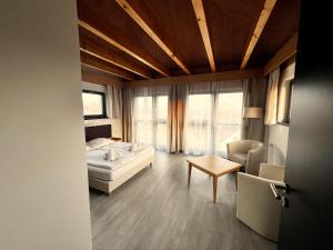 Voodi või voodid majutusasutuse Hotel Žabčice toas
