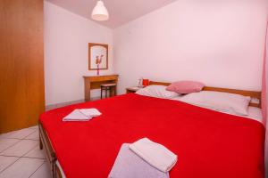 Postel nebo postele na pokoji v ubytování Apartments Sopic