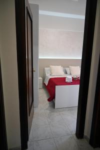 Postel nebo postele na pokoji v ubytování B&B Le Corti