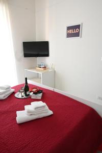 TV a/nebo společenská místnost v ubytování B&B Le Corti