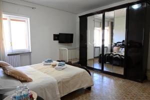 Postel nebo postele na pokoji v ubytování B&B Le Corti