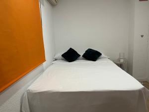 Posteľ alebo postele v izbe v ubytovaní Guest House Leo
