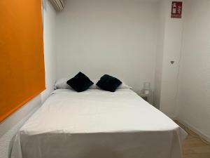 Posteľ alebo postele v izbe v ubytovaní Guest House Leo