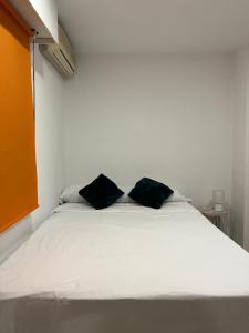 Posteľ alebo postele v izbe v ubytovaní Guest House Leo