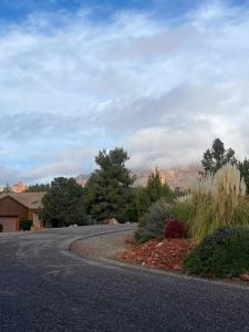 a winding road with mountains in the background at Family Friendly Home with Character and Charm in Sedona