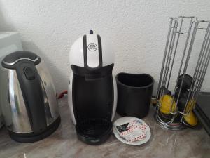 Příslušenství pro přípravu čaje a kávy v ubytování Guest House Lona