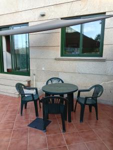 Fotografia z galérie ubytovania Apartamento con terraza y piscina v destinácii Ribeira