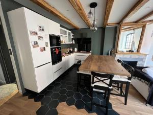 Kuchyň nebo kuchyňský kout v ubytování Appartement neuf et cosy - Centre ville 3eme étage