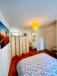Posteľ alebo postele v izbe v ubytovaní Le petit 2 Caps - Hyper centre - spacieux - 1er étage