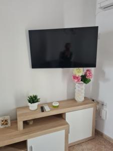 Telewizja i/lub zestaw kina domowego w obiekcie La encantá