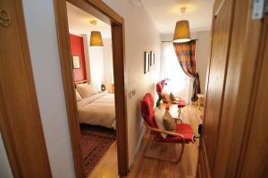 A bed or beds in a room at Ahmet Efendi Evi