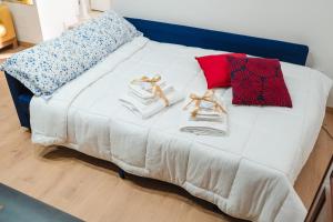 A bed or beds in a room at DOMUS 73 Apulian holidays