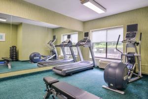 a gym with several tread machines in a room at SpringHill Suites Pinehurst Southern Pines in Pinehurst