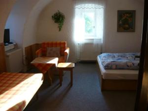Кровать или кровати в номере Penzion Ski