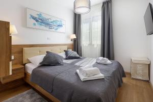 Ένα ή περισσότερα κρεβάτια σε δωμάτιο στο Villa Toja +37 φωτογραφίες
