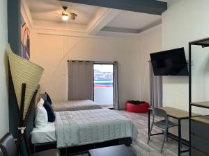 Postel nebo postele na pokoji v ubytování Hostal 170 + 14 fotografií