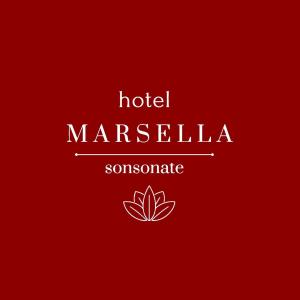 a sign that reads hotel marselha someloono at hotel marsella in Sonsonate