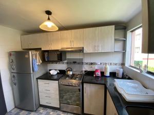Köök või kööginurk majutusasutuses Apart La Posada