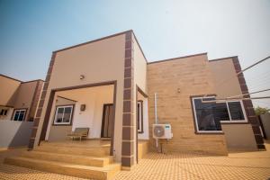 a rendering of a house with the front of it at Big chill stays in Apenkwa