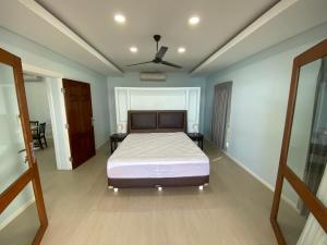 Postel nebo postele na pokoji v ubytování Nasara Resort Mentawai