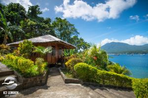 a resort with a view of the water at K2 Lembeh Dive Resort in Bitung