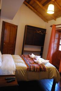 Letto o letti in una camera di Kiswar Lodg