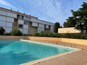 Bazén v ubytovaní Appartement 2 pièces avec piscine, proche plage et commodités - Argelès-sur-Mer - FR-1-225-777 alebo v jeho blízkosti