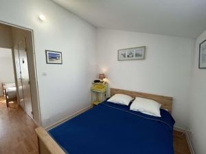 Posteľ alebo postele v izbe v ubytovaní Maison 3 pièces à 400m de la plage, avec terrasse et parking - Saint Hilaire de Riez - FR-1-224C-224