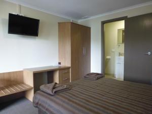 Postel nebo postele na pokoji v ubytování Seabrook Hotel