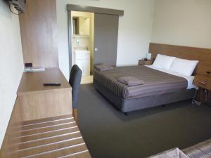 Postel nebo postele na pokoji v ubytování Seabrook Hotel