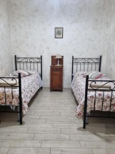 Postel nebo postele na pokoji v ubytování Casa Vacanza Sweet Home