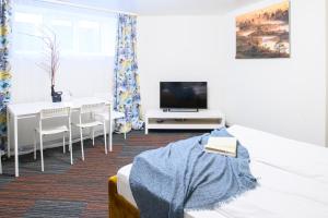 TV a/nebo společenská místnost v ubytování Stay to Stay Apartments - võtmeta sissepääs